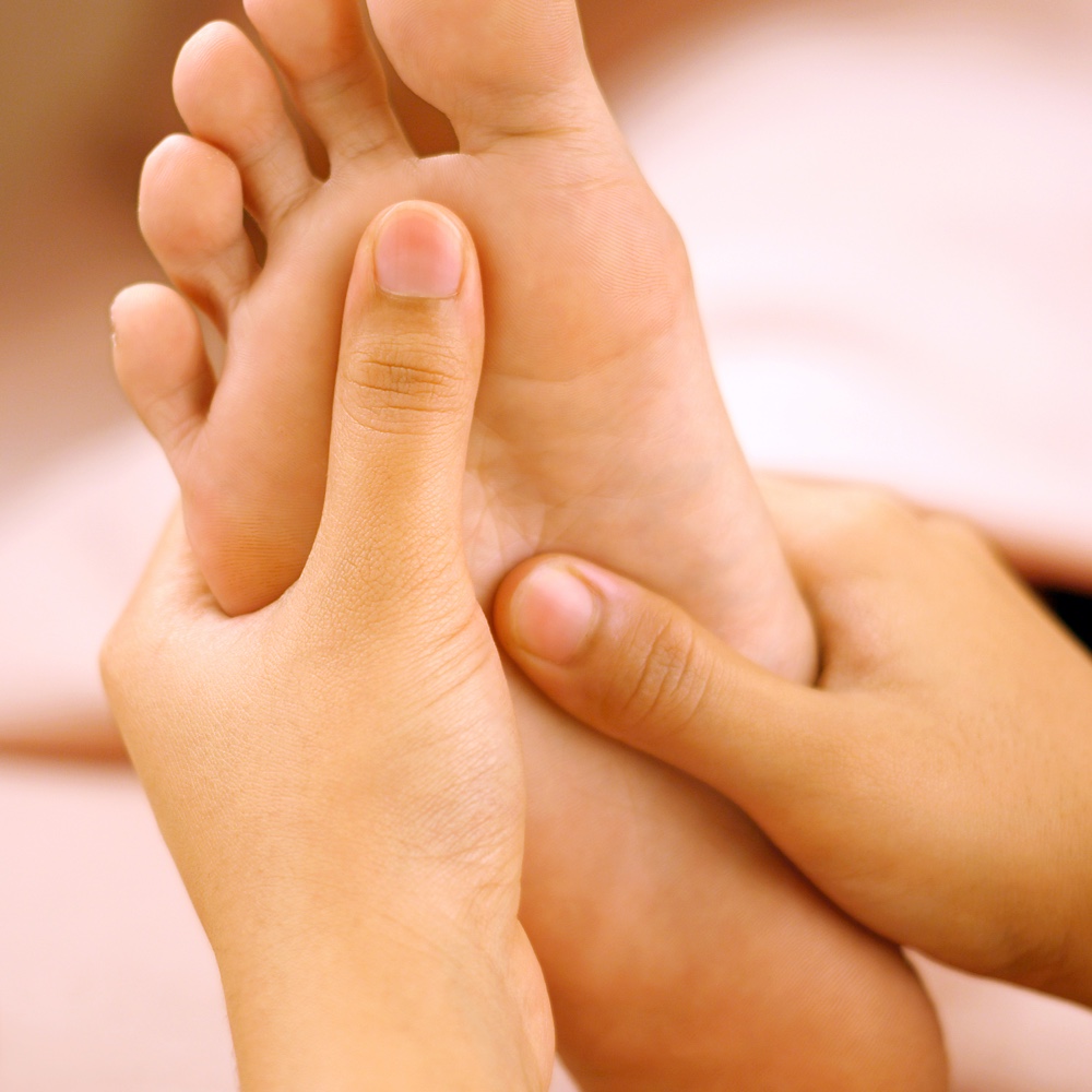 Foot reflexology treatment